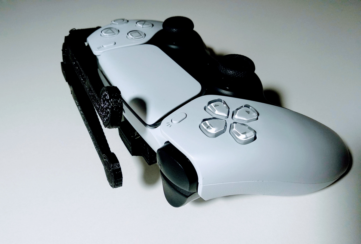 PS5 Dualsense adaptée main gauche à palettes