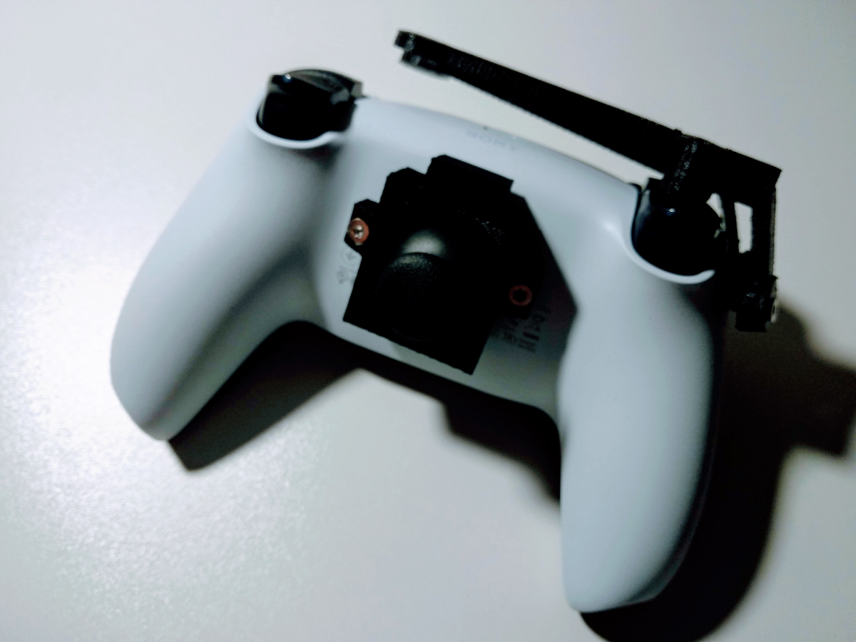 PS5 Dualsense adaptée main droite à palettes