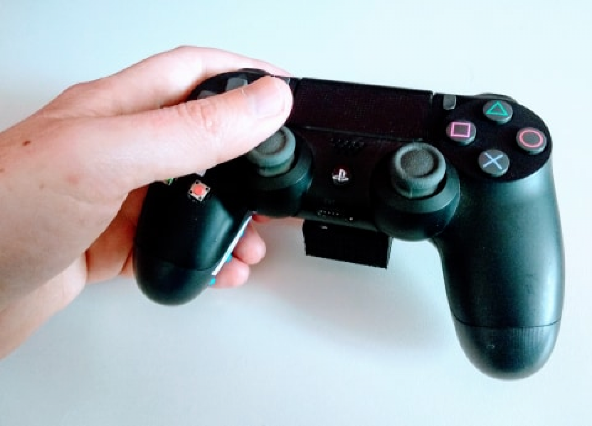 Manette PS4 adaptée pour main gauche (stick central)